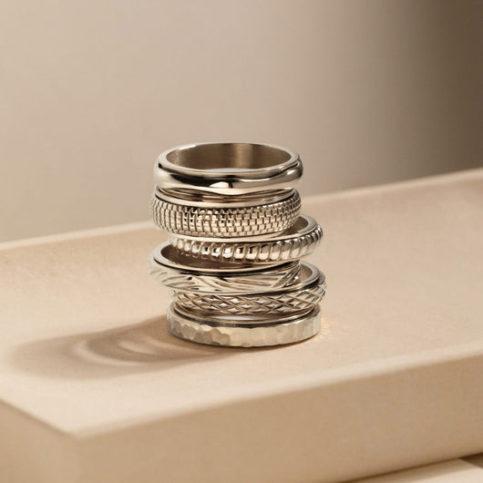 silver spinning molten ring