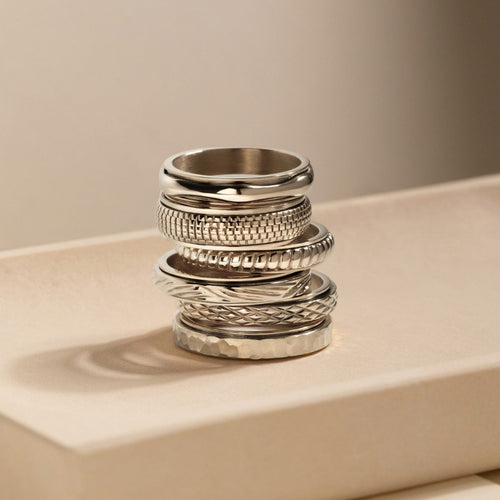 silver spinning pleated ring