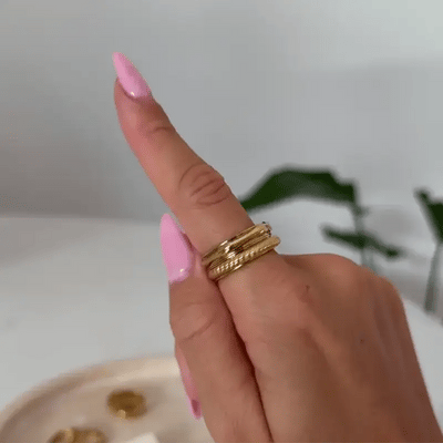 silver spinning pleated ring