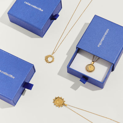gold rotating moon necklace
