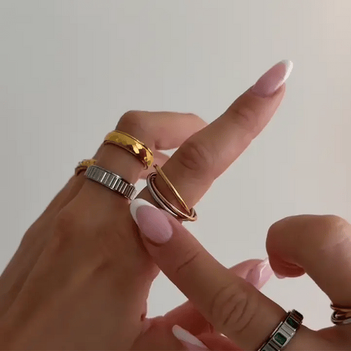 trio gliding fidget ring