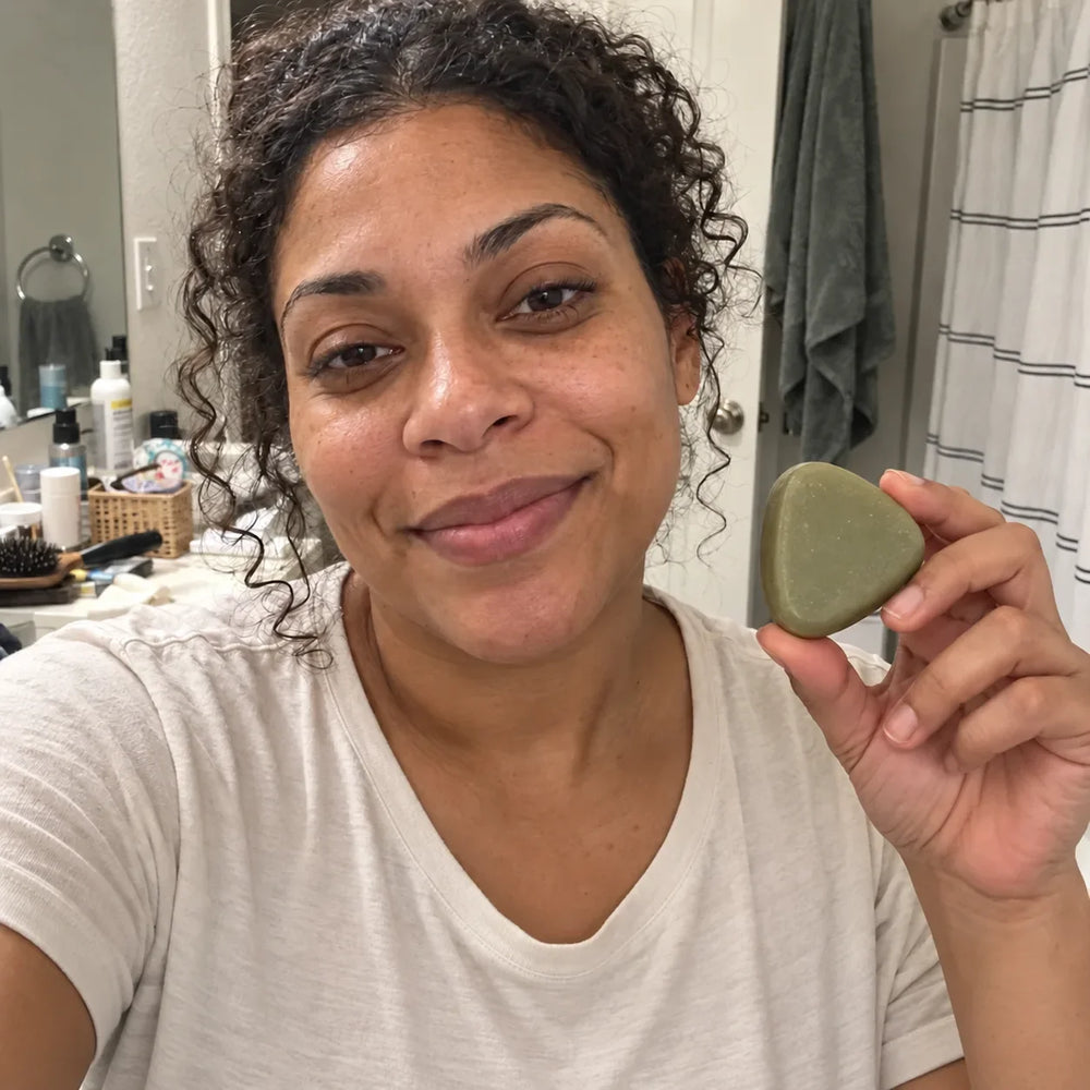 AI-generated model holding an unbranded scalp cleansing bar. Not an actual customer.